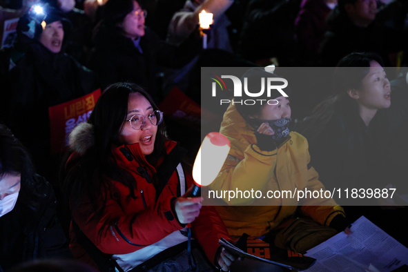 Thousands of citizens gather across from the National Assembly to demand the impeachment of President Yoon Suk-yeol in Seoul, South Korea, o...