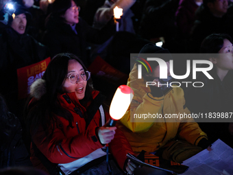 Thousands of citizens gather across from the National Assembly to demand the impeachment of President Yoon Suk-yeol in Seoul, South Korea, o...