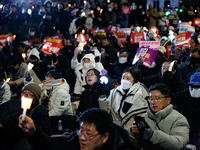 Thousands of citizens gather across from the National Assembly to demand the impeachment of President Yoon Suk-yeol in Seoul, South Korea, o...