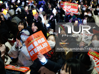 Thousands of citizens gather across from the National Assembly to demand the impeachment of President Yoon Suk-yeol in Seoul, South Korea, o...