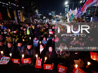 Thousands of citizens gather across from the National Assembly to demand the impeachment of President Yoon Suk-yeol in Seoul, South Korea, o...