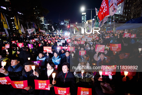 Thousands of citizens gather across from the National Assembly to demand the impeachment of President Yoon Suk-yeol in Seoul, South Korea, o...