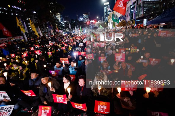 Thousands of citizens gather across from the National Assembly to demand the impeachment of President Yoon Suk-yeol in Seoul, South Korea, o...