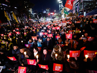 Thousands of citizens gather across from the National Assembly to demand the impeachment of President Yoon Suk-yeol in Seoul, South Korea, o...