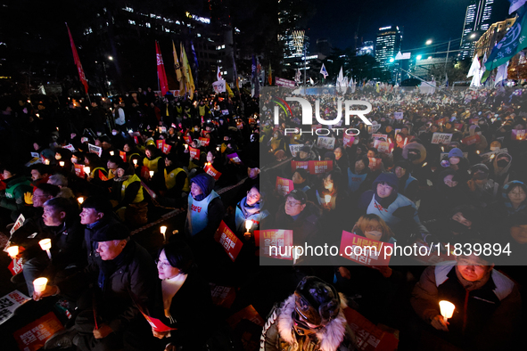 Thousands of citizens gather across from the National Assembly to demand the impeachment of President Yoon Suk-yeol in Seoul, South Korea, o...