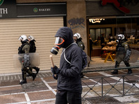 People protest in Athens, Greece, on December 6, 2024, marking the 16th anniversary of the death of 15-year-old Alexis Grigoropoulos, who is...