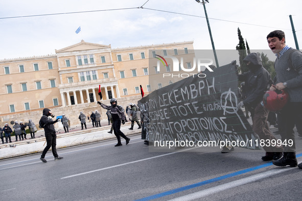 People protest in Athens, Greece, on December 6, 2024, marking the 16th anniversary of the death of 15-year-old Alexis Grigoropoulos, who is...