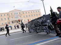 People protest in Athens, Greece, on December 6, 2024, marking the 16th anniversary of the death of 15-year-old Alexis Grigoropoulos, who is...