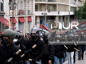 People protest in Athens, Greece, on December 6, 2024, marking the 16th anniversary of the death of 15-year-old Alexis Grigoropoulos, who is...