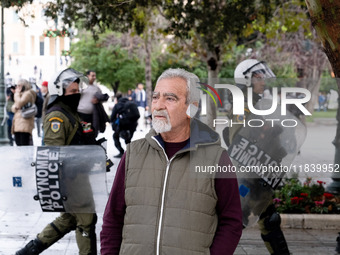 People protest in Athens, Greece, on December 6, 2024, marking the 16th anniversary of the death of 15-year-old Alexis Grigoropoulos, who is...