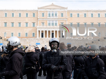 People protest in Athens, Greece, on December 6, 2024, marking the 16th anniversary of the death of 15-year-old Alexis Grigoropoulos, who is...