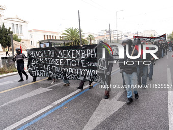 People protest in Athens, Greece, on December 6, 2024, marking the 16th anniversary of the death of 15-year-old Alexis Grigoropoulos, who is...