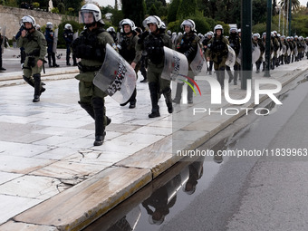 People protest in Athens, Greece, on December 6, 2024, marking the 16th anniversary of the death of 15-year-old Alexis Grigoropoulos, who is...