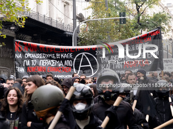 People protest in Athens, Greece, on December 6, 2024, marking the 16th anniversary of the death of 15-year-old Alexis Grigoropoulos, who is...