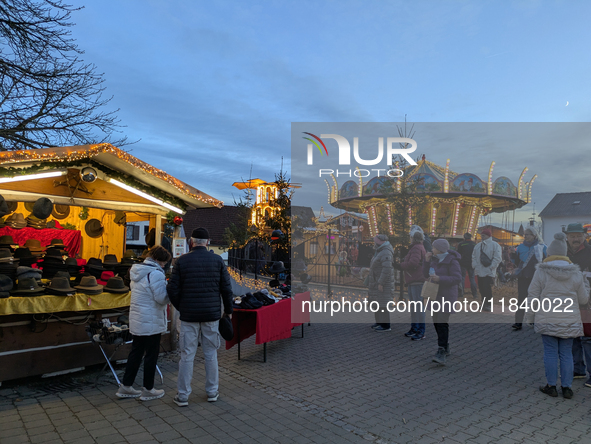 The historic center of Abensberg, Bavaria, Germany, on December 5, 2024, becomes a festive destination during the Christmas season. The trad...