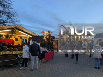 The historic center of Abensberg, Bavaria, Germany, on December 5, 2024, becomes a festive destination during the Christmas season. The trad...