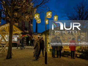 The Christmas Market at Kuchlbauer Turm, Kuchlbauer Tower, in Abensberg, Bavaria, Germany, on December 5, 2024, becomes a festive destinatio...