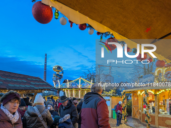 The historic center of Abensberg, Bavaria, Germany, on December 5, 2024, becomes a festive destination during the Christmas season. The trad...