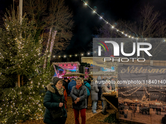 The historic center of Abensberg, Bavaria, Germany, on December 5, 2024, becomes a festive destination during the Christmas season. The trad...