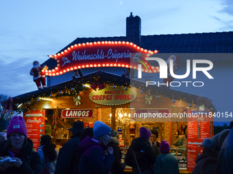 The historic center of Abensberg, Bavaria, Germany, on December 5, 2024, becomes a festive destination during the Christmas season. The trad...