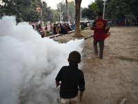 An employee of Dhaka South City Corporation sprays pesticide to kill mosquitoes in Dhaka, Bangladesh, on December 6, 2024. Since January 1,...