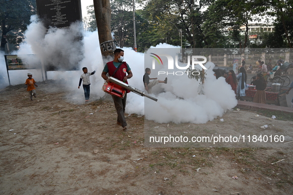 An Employee Of Dhaka South City Corporation Sprays Pesticide For Kill Mosquitoes In Dhaka, Bangladesh On December 6, 2024. Since January 1,...