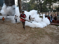 An Employee Of Dhaka South City Corporation Sprays Pesticide For Kill Mosquitoes In Dhaka, Bangladesh On December 6, 2024. Since January 1,...