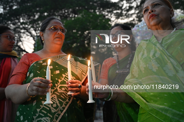 Members Of A Social Organization Are Holding A Candlelight Vigil In Memory Of Relatives Lost In The Liberation War 1971 And Those Killed In...