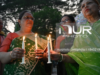 Members Of A Social Organization Are Holding A Candlelight Vigil In Memory Of Relatives Lost In The Liberation War 1971 And Those Killed In...