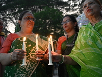 Members Of A Social Organization Are Holding A Candlelight Vigil In Memory Of Relatives Lost In The Liberation War 1971 And Those Killed In...