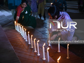 Members Of A Social Organization Are Holding A Candlelight Vigil In Memory Of Relatives Lost In The Liberation War 1971 And Those Killed In...