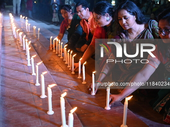 Members Of A Social Organization Are Holding A Candlelight Vigil In Memory Of Relatives Lost In The Liberation War 1971 And Those Killed In...