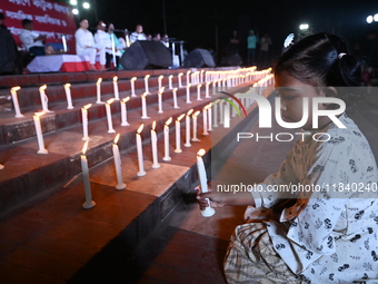 Members Of A Social Organization Are Holding A Candlelight Vigil In Memory Of Relatives Lost In The Liberation War 1971 And Those Killed In...