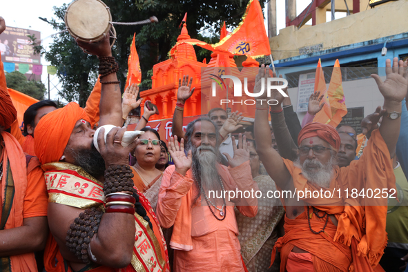 Hindu monks and members of Hindu Jagaran Monch hold a protest against the recent arrest of ISKCON Bangladesh priest Chinmoy Krishna Das by D...