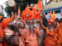 Hindu monks and members of Hindu Jagaran Monch hold a protest against the recent arrest of ISKCON Bangladesh priest Chinmoy Krishna Das by D...