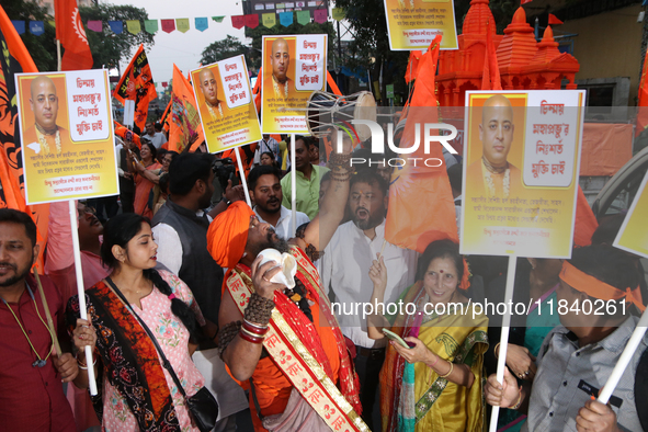 Hindu monks and members of Hindu Jagaran Monch hold a protest against the recent arrest of ISKCON Bangladesh priest Chinmoy Krishna Das by D...