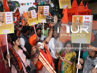 Hindu monks and members of Hindu Jagaran Monch hold a protest against the recent arrest of ISKCON Bangladesh priest Chinmoy Krishna Das by D...