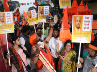 Hindu monks and members of Hindu Jagaran Monch hold a protest against the recent arrest of ISKCON Bangladesh priest Chinmoy Krishna Das by D...