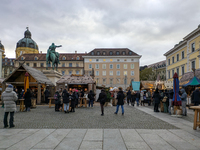 Visitors experience the festive atmosphere of the Medieval Christmas Market in Munich, Bavaria, Germany, on December 6, 2024. The market, lo...