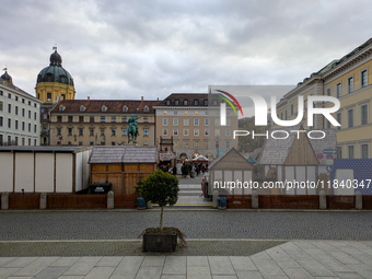 Visitors experience the festive atmosphere of the Medieval Christmas Market in Munich, Bavaria, Germany, on December 6, 2024. The market, lo...