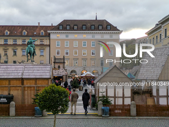 Visitors experience the festive atmosphere of the Medieval Christmas Market in Munich, Bavaria, Germany, on December 6, 2024. The market, lo...