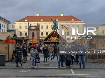 Visitors experience the festive atmosphere of the Medieval Christmas Market in Munich, Bavaria, Germany, on December 6, 2024. The market, lo...