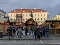 Visitors experience the festive atmosphere of the Medieval Christmas Market in Munich, Bavaria, Germany, on December 6, 2024. The market, lo...