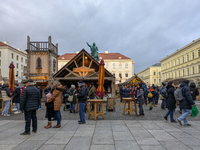 Visitors experience the festive atmosphere of the Medieval Christmas Market in Munich, Bavaria, Germany, on December 6, 2024. The market, lo...