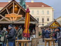 Visitors experience the festive atmosphere of the Medieval Christmas Market in Munich, Bavaria, Germany, on December 6, 2024. The market, lo...