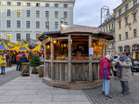 Visitors experience the festive atmosphere of the Medieval Christmas Market in Munich, Bavaria, Germany, on December 6, 2024. The market, lo...