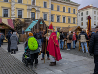 Visitors experience the festive atmosphere of the Medieval Christmas Market in Munich, Bavaria, Germany, on December 6, 2024. The market, lo...