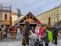 Visitors experience the festive atmosphere of the Medieval Christmas Market in Munich, Bavaria, Germany, on December 6, 2024. The market, lo...