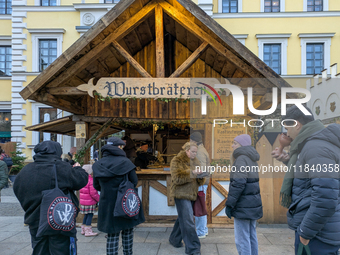 Visitors experience the festive atmosphere of the Medieval Christmas Market in Munich, Bavaria, Germany, on December 6, 2024. The market, lo...