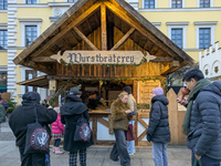 Visitors experience the festive atmosphere of the Medieval Christmas Market in Munich, Bavaria, Germany, on December 6, 2024. The market, lo...